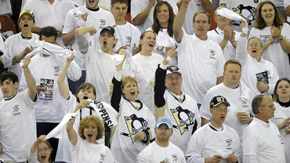 Penguins fans cheer on their team against the Rangers during a "whiteout" last night at Mellon Arena.