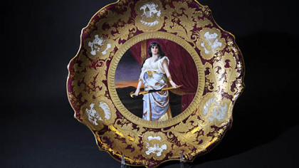 Lot No. 2293 A of the Vernon Regal auction is a Royal Vienna porcelain charger showing Old Testament figure Judith with a sword.
