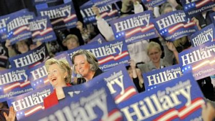 Sen. Hillary Rodham Clinton in a sea of supporters at the Montgomery County Community College in Blue Bell, Pa., in March. Obama supporters are now doing what they can to heal hurt feelings == without pushing too hard.