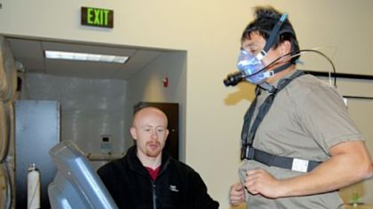 Navy SEAL Joel McGuire participates in an aerobic capacity analysis while being monitored by Greg Hovey, exercise physiologist from the University of Pittsburgh, at Naval Special Warfare Group 2 in Little Creek, Va.