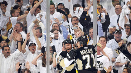 The Penguins' Ryan Malone celebrates Evgeni Malkin's goal against the Flyers at the Mellon Arena last night.