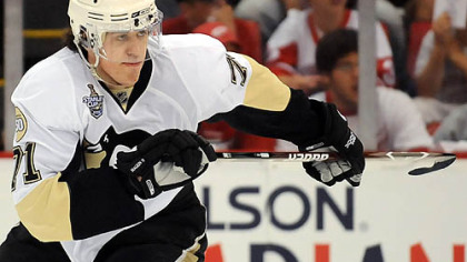 Penguins Evgeni Malkin skates up ice against the Red Wings at the Joe Louis Arena in the Stanley Cup final against Detroit.
