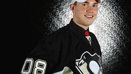 Nathan Moon poses for his first NHL portrait after being the Penguins' first pick -- No. 120 overall -- in Ottawa.