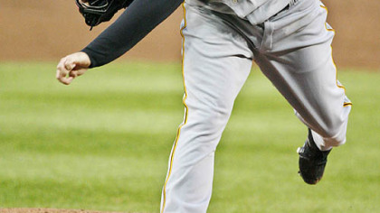 Pirates' starter Phil Dumatrait pitches to the Washington Nationals during the first inning of their baseball game last night in Washington.