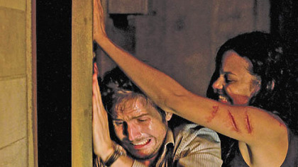 Michael Stahl-David and Jessica Lucas in "Cloverfield."