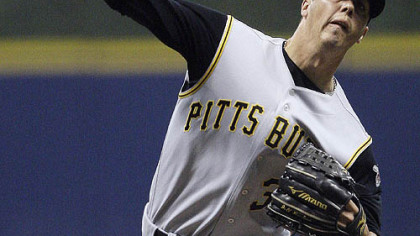 Starting pitcher Jeff Karstens throws during the first inning of yesterday's game against the Milwaukee Brewers.