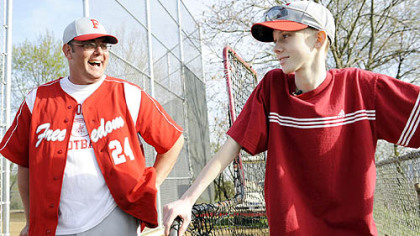 Freedom's John Challis talks with head coach Steve Wetzel after a game April 24.