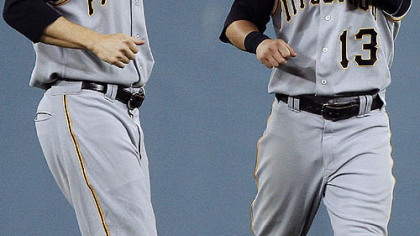 Center fielder Nate McLouth, right, is congratulated by Jason Bay after the Pirates came from behind to defeat the Los Angeles Dodgers 6-3 at Dodger Stadium last night in Los Angeles.