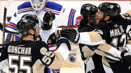The Penguins celebrate Marian Hossa's goal against the Rangers yesterday in the second period at Mellon Arena.