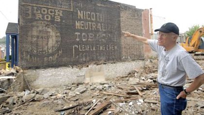 Demolition in Carnegie has revealed an ancient advertisement for Mail Pouch Tobacco on the side of Robert Miller?s building at 311 East Main St. Mr. Miller owns Flexitrol Lighting Co.