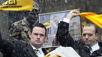 Pittsburgh Mayor Luke Ravenstahl, left, and Allegheny County Chief Executive Dan Onorato wave their Terrible Towels in  honor of Myron Cope at a rally at the City-County Building today.