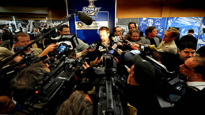 Gary Roberts talks with members of the media during Media Day at the COBO Center, Detroit, yesterday.