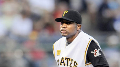 Pirates' pitcher Denny Bautista goes down on one knee after getting hit by the ball last night against the Rays.