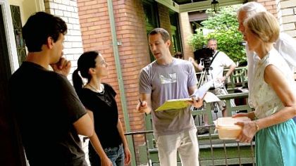 Jeremy Braverman, center, directs actors, from left, Sam Turich, Carla Bianco, Bingo O'Malley and Rita Gob during the production of "Regent Square," a film for the Neighborhood Narrative project. Cinematographer John Rice is in the background.