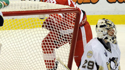 The Red Wings' Jiri Hudler celebrates Darrien Helm's goal against the Penguins in the second period of Game 5 of the Stanley Cup final last night in Detroit.