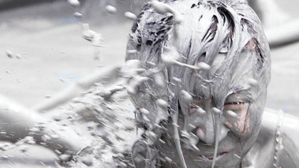 BORYEONG, South Korea -- A woman plays during the Mud Festival. The 11th annual mud festival features mud wrestling, mud sliding and a mud king contest.