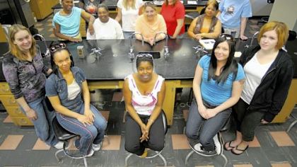 The Introduction to Biological Sciences at CCAC?s Allegheny campus on the North Side. Back row: Nakia Muhammand, Amanda Grady, Barbara Byers, Garnet Trembulak. Middle row: Natia Platt, Rosalind Smith, Stacy McDonald, Arlene White. Front row: Heather Candelore, Tenisha Blackwell, Yalonda Clemons, Krystal Garcia, Julia Vermeulen