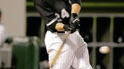 Chicago's Joe Crede hits a two-run homer in the sixth inning -- one of four White Sox home runs -- as the White Sox scored 11 unanswered runs in routing the Pirates, 16-5.