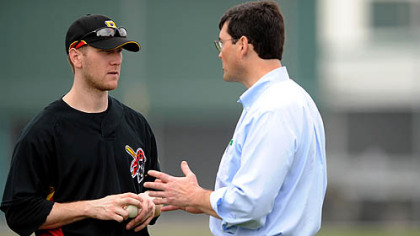 Pirates chairman Robert Nutting catches up with Jason Bay at camp this week.