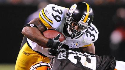 Willie Parker is tackled by the Browns' Mike Adams.