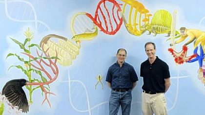 Duquesne professors David Lampe, left, and John Pollock, pose for a portrait inside the university's Mellon Science Hall. The pair will be holding a Darwin Day celebration to recognize Darwin's birthday and the importance of evolution in life.
