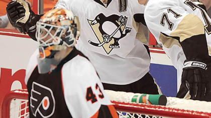 Ryan Malone celebrates his third-period goal.