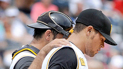 Pirates catcher Raul Chavez comforts starter Ian Snell after Snell gives up a home run to the Blue Jays' Alex Lind in the fourth inning.