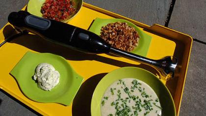 Food made in an immersion blender includes Cool Curry Senegalese Soup, foreground right, and, clockwise from left of the soup, mayo, salsa and bread crumbs.