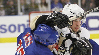 New York Rangers' Paul Mara, left, collides with Pittsburgh Penguins' Sidney Crosby in the first period during Game 4 of an NHL Eastern Conference semifinal hockey playoff series Thursday, May 1, 2008 at Madison Square Garden in New York.
