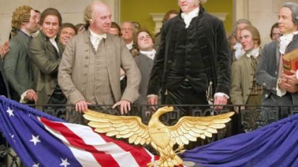 In "John Adams," Paul Giamatti, left center, portrays John Adams and David Morse is George Washington.
