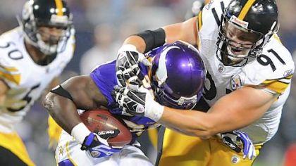 Aaron Smith, right, is a distinguished member of the Steelers' defensive line, but he's over 30.