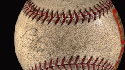 Babe Ruth's home run ball No. 712, showing a faded autograph.