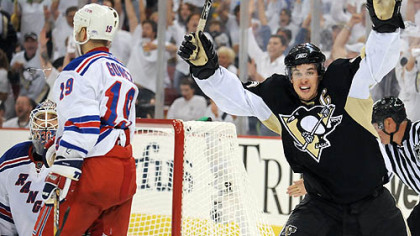 Crosby celebrates a Penguins third-period goal.