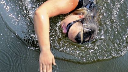 352 miles later Katie Spotz, 21, of Mentor, Ohio, passes beneath the Rachel Carson Bridge yesterday as she nears completion of a swim of the entire length of the Allegheny River. She?s believed to be the first person to accomplish that feat.