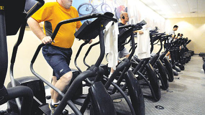 Jay Crown, 36, of Fox Chapel, uses the StairMaster at Bally's Downtown.