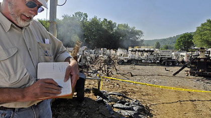 David O'Hara, vice president of Snyder Brothers Oil and Gas Co. Inc., makes notes on the test well on the outskirts of Kittanning. The Kittanning-based firm is testing for natural gas in the Marcellus Shale formation, more than a mile deep. The geologic formation stretches from New York to West Virginia, through much of Pennsylvania.