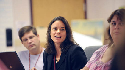 Dr. Brenda K. Freeman, center, a psychiatrist for a Community Treatment Team operated by Mercy Behavioral Health, says some patients refuse treatment and end up hospitalized or in jail. Team members have tracked down patients under bridges, in bars or even in other states.
