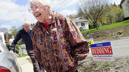 Hedda Elk and her husband, George, both 90, leave the Valencia Borough Building after casting their votes yesterday on her birthday. They never have missed voting in an election since turning 21.