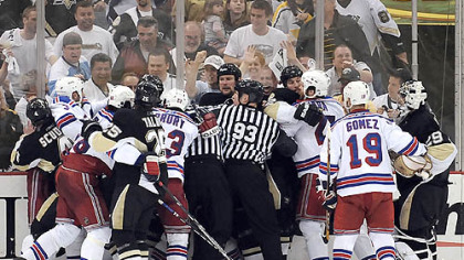 The Penguins and Rangers scuffle in the final seconds of game 2.