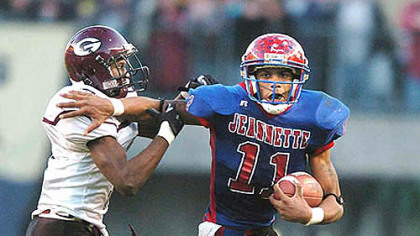 Nov. 24, 2006: Pryor tries to fend off Greensburg Central Catholic's Chris Hayden-Martin in the WPIAL Class AA championship game at Heinz Field. Jeannette won, 24-14.