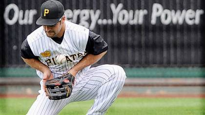 Pirates right fielder Xavier Nady bobbles the ball on a single by Tampa Bay's Carlos Pena in the second inning yesterday at PNC Park.