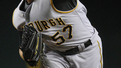 Zach Duke throws against the Arizona Diamondbacks in the first inning of last night's game in Phoenix.