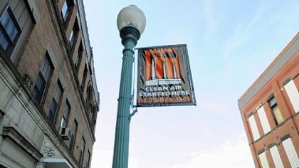 Flying above McKean Avenue, a banner commemorating the 1948 inversion.