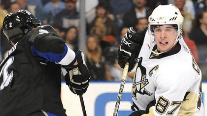 Sidney Crosby is stopped by Lightning goalie Mike Smith.