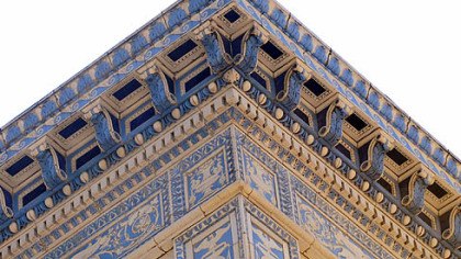The Buhl Building is clad with blue and white tiles on three sides; the side overlooking Market Square is brick.