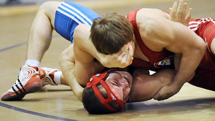 WPIAL All-Star Adam Harold, bottom, of North Hills, battles Wisconsin's  Cody Friemoth.