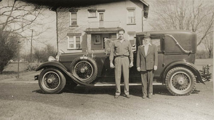 Vernon Regal, right, with the family's Rolls Royce that he restored. Man on left is unidentified.