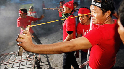 BANGKOK --  Government supporters clash against anti-government protesters. Within hours after the clashes began, Prime Minister Samak Sundaravej declared a state of emergency in the city. One person has been killed and more than 30 have been injured in the fighting.