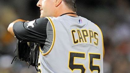 Pirates closer Matt Capps wipes his face after giving up a solo home run to tie the game against the Orioles in the ninth inning last night in Baltimore.