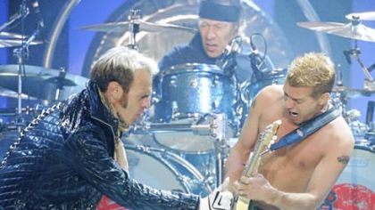 From left, David Lee Roth, Alex Van Halen and Eddie Van Halen -- shown performing in Las Vegas this month -- will rock the Mellon Arena tomorrow. Eddie Van Halen's son, Wolfgang Van Halen, will be on bass guitar.